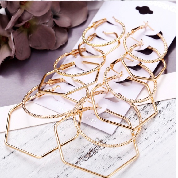 Jewelry - Six pair of gold tone, hoop style earrings.
